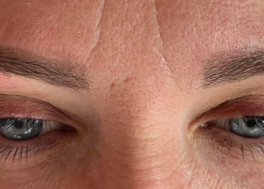 Close-up of well-groomed brows and radiant eyes at Sunshine and Daisies, Gillingham, England, GB.