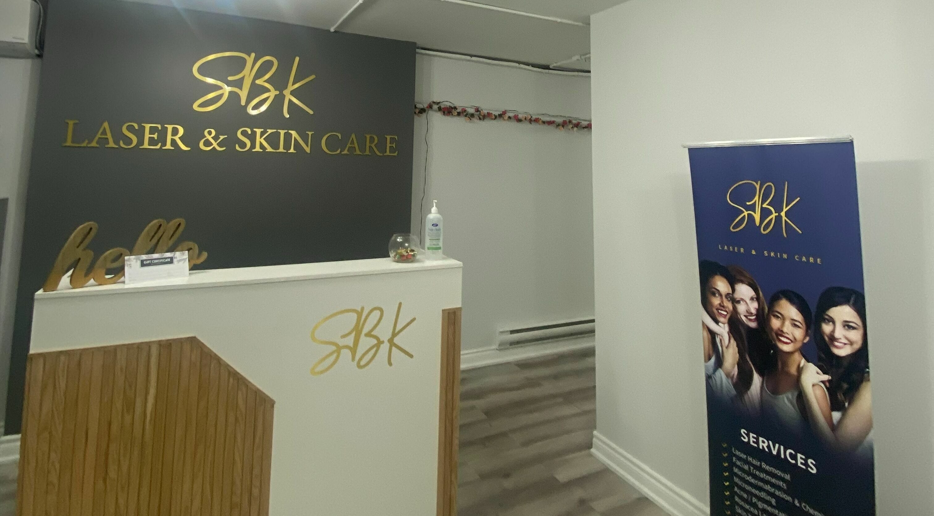 Reception of SBK Laser And Skin Care in Toronto, Ontario, CA, featuring logo and service banner.