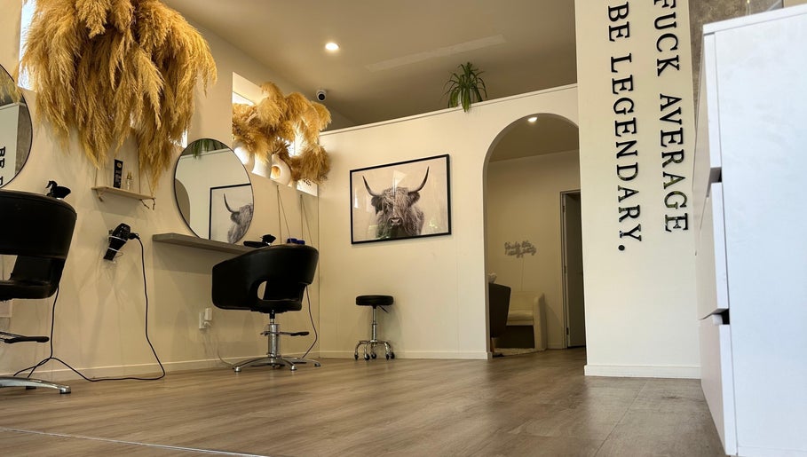 Stylish salon interior at Urban New Concept, Christchurch, Canterbury, NZ with modern decor and seating.