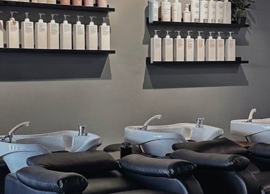 Urban New Concept hair wash area with sleek washbasins in Christchurch, Canterbury, NZ.