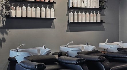 Urban New Concept hair wash area with sleek washbasins in Christchurch, Canterbury, NZ.