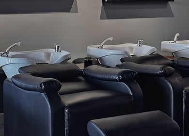 Modern wash stations at Urban New Concept, Christchurch, Canterbury, NZ offering a stylish salon experience.