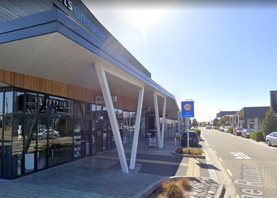 Urban New Concept facade in Christchurch, Canterbury, NZ showcasing modern architecture and inviting storefronts.