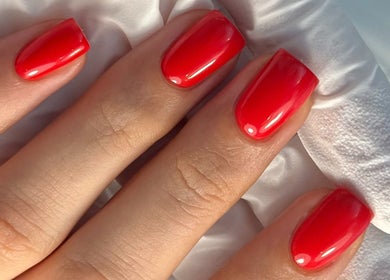Vibrant red manicure at NAILME STUDIO, Melbourne, Victoria, AU, showcasing expert nail art.
