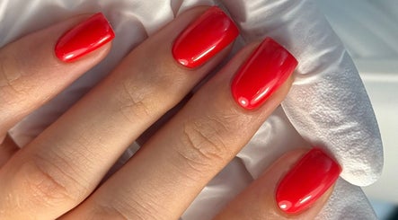 Vibrant red manicure at NAILME STUDIO, Melbourne, Victoria, AU, showcasing expert nail art.
