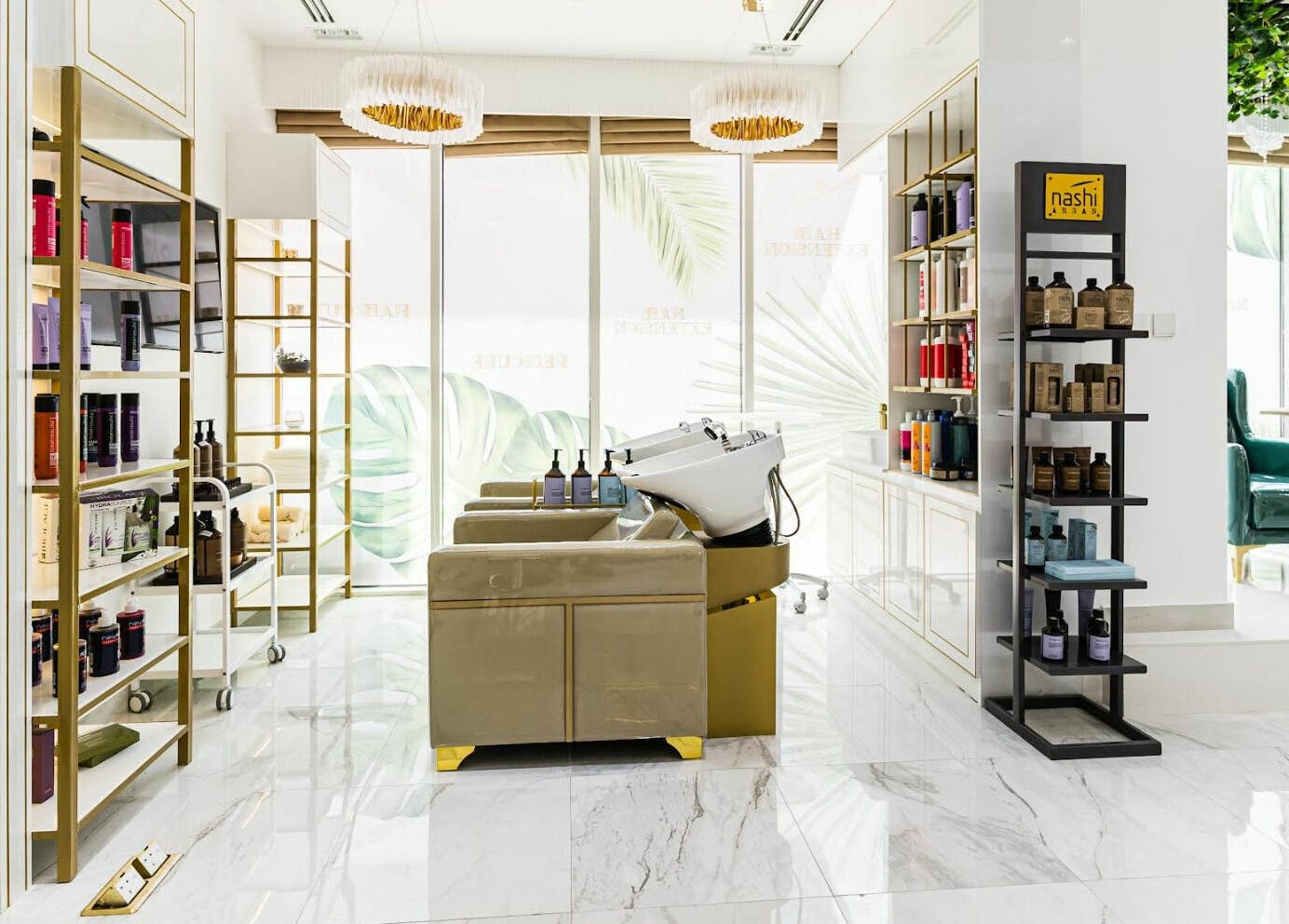 Luxurious salon interior at Cherish Ladies Salon, دبي, دبي, AE featuring modern washing stations and product shelves.