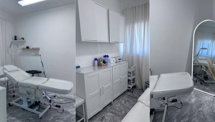 Elegant treatment room at The Vanity Aesthetics in London, England, GB, featuring modern white decor.