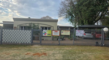 Entrance of Beautistic Salon in Pretoria, Gauteng, ZA, showcasing modern exterior and welcoming vibe.