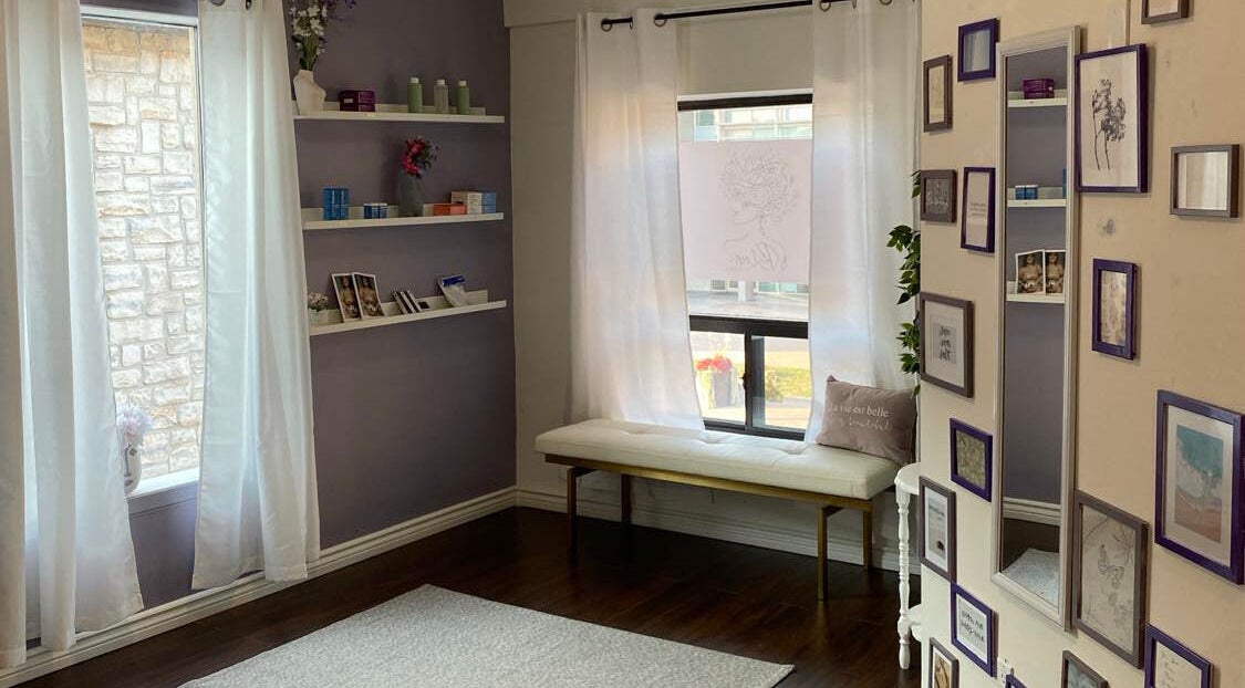Calming waiting area at Bloom Aesthetics, Cambridge, Ontario, CA with elegant decor and natural light.