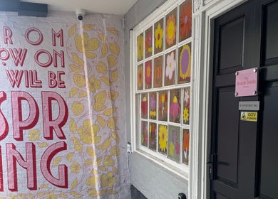 Colorful wall art and entrance door at Sophie Knight Studio, Hereford, England, GB, welcoming spring.