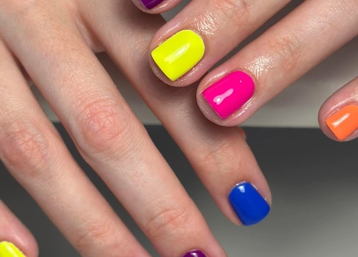 Colorful nail art at Kirsty’s Nails and Beauty, Chopwell, England, GB offers trendy vibrant manicures.