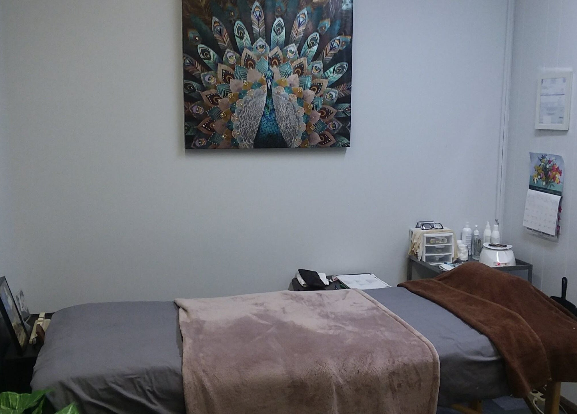 Tranquil waxing room at Waxing by Keisha ☆ in Hampton, Virginia, US, featuring soothing decor and a treatment bed.