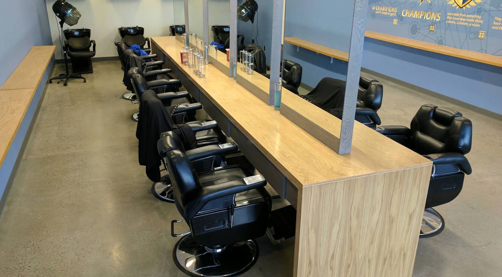 Stylish interior of Champions Barbering Institute in Portland, Oregon, US, featuring modern barber chairs.