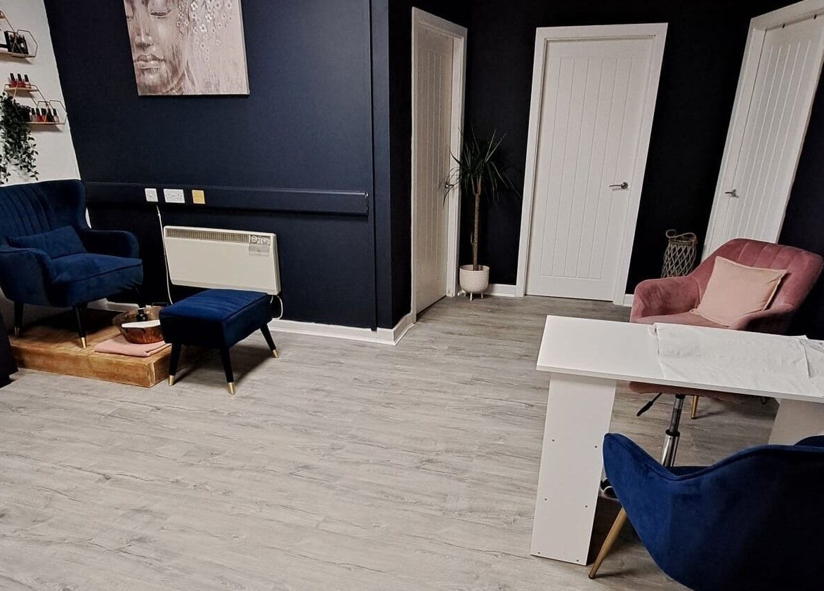 Relaxing lounge at Bespoke Beauty SP, Newton-Le-Willows, England, GB, featuring plush seating and elegant decor.