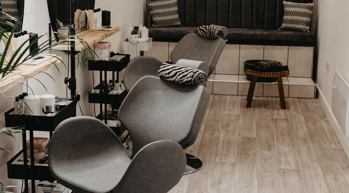 Elegant interior of Kerry P Permanent Makeup, Tattoo and Beauty, Ackworth, England, GB showcasing modern chairs.