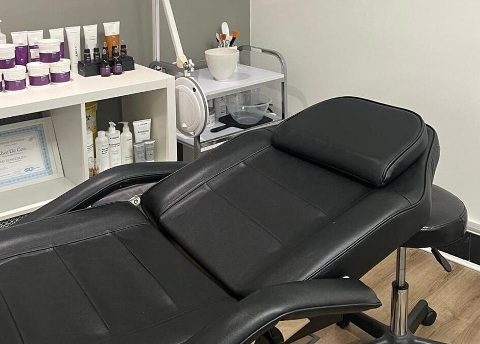 Cozy beauty treatment room at Skimprove with a black recliner in London, England, GB.