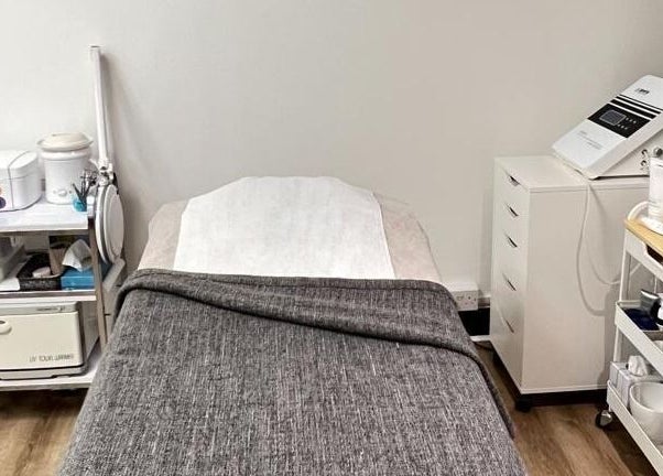 Cozy skincare treatment room at Skimprove, equipped with modern devices in London, England, GB.