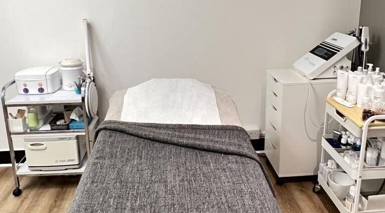 Cozy skincare treatment room at Skimprove, equipped with modern devices in London, England, GB.