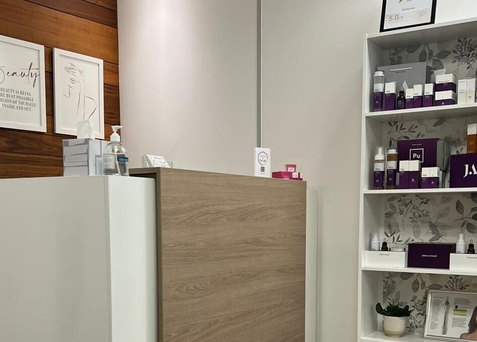 Stylish reception area at Skimprove, London, England, GB showcasing beauty products and decor.