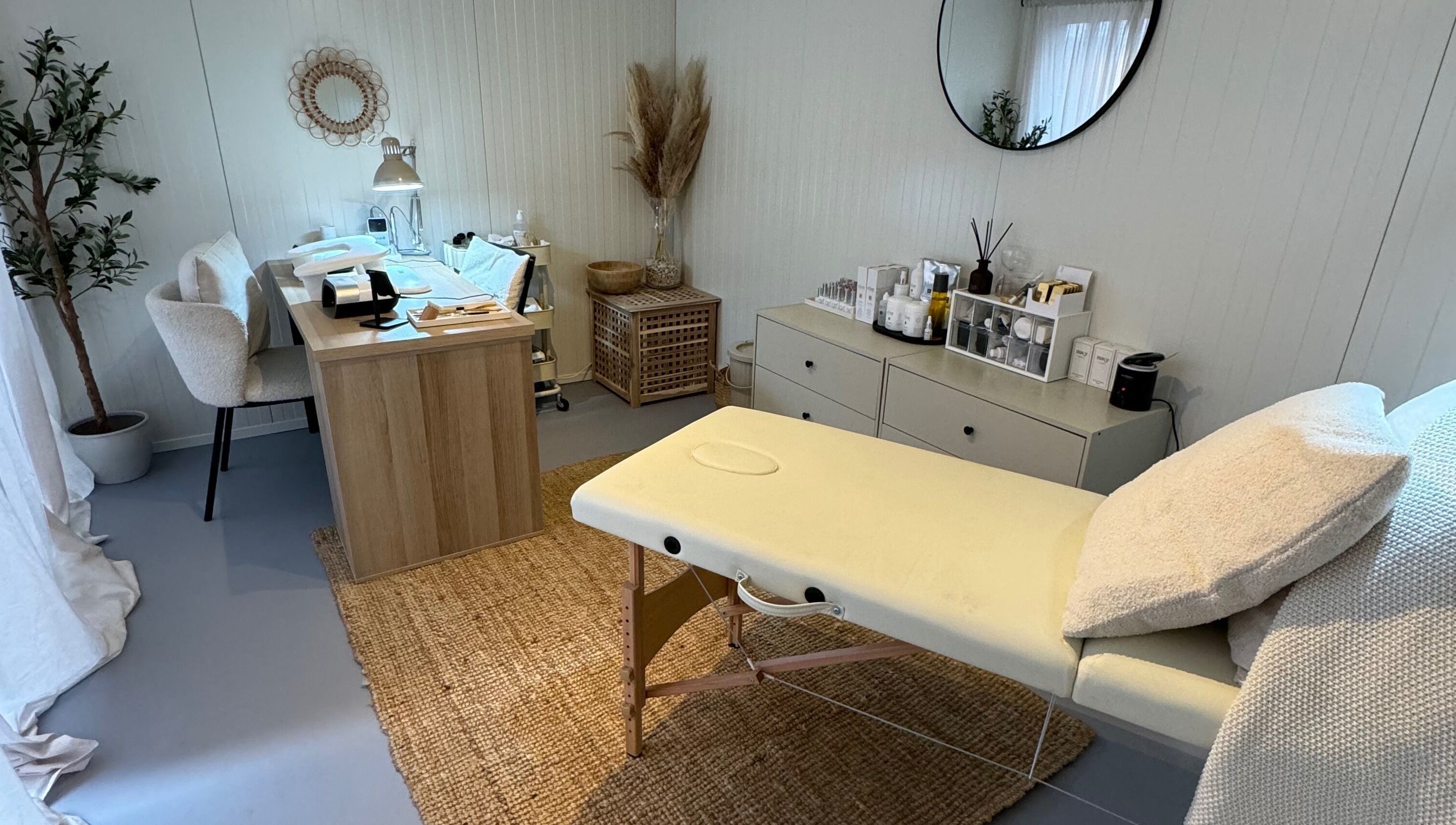 Tranquil room at Freedom Studio, Mountsorrel, England, with a massage table and cozy decor.