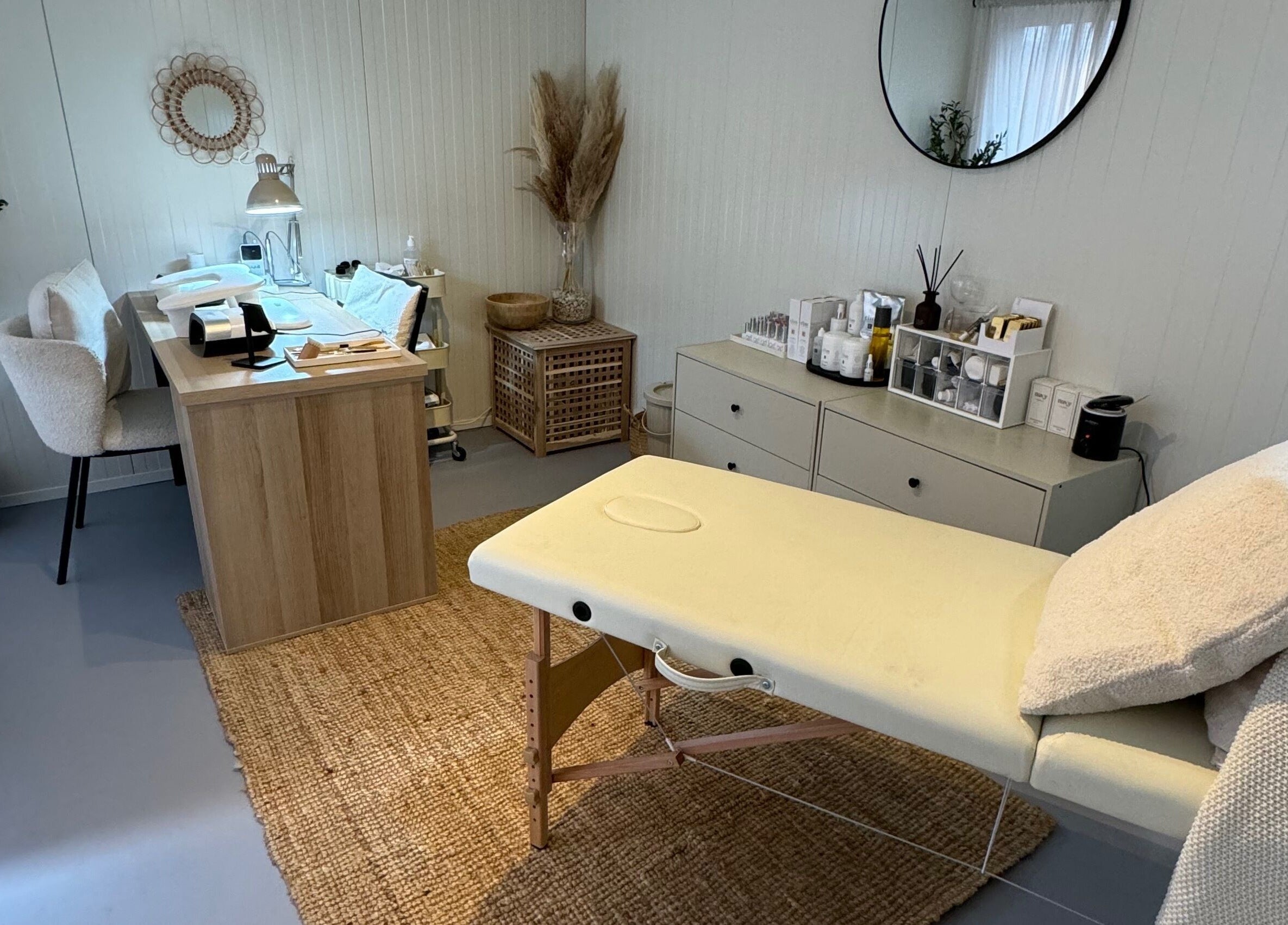 Tranquil room at Freedom Studio, Mountsorrel, England, with a massage table and cozy decor.