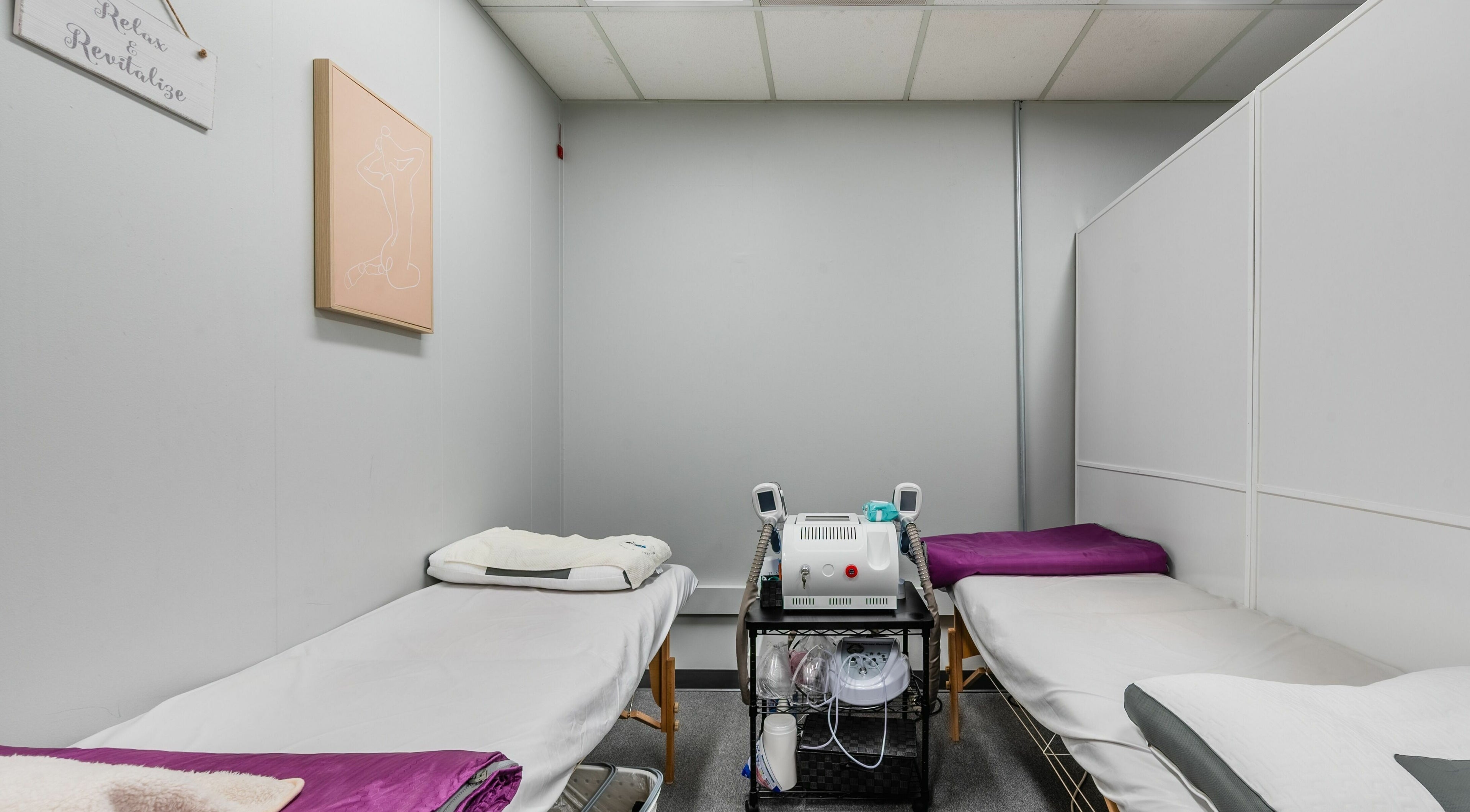 Relaxing treatment room at Beauty Sculpt, LLC in San Jose, California, US, featuring two massage beds.