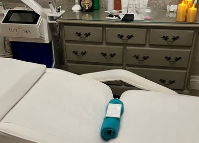 Spa treatment room at NR Derma Aesthetics, Bicester, England, GB with relaxing ambiance and professional setup.