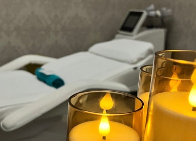 Candles and a massage table at NR Derma Aesthetics, Bicester, England, GB.