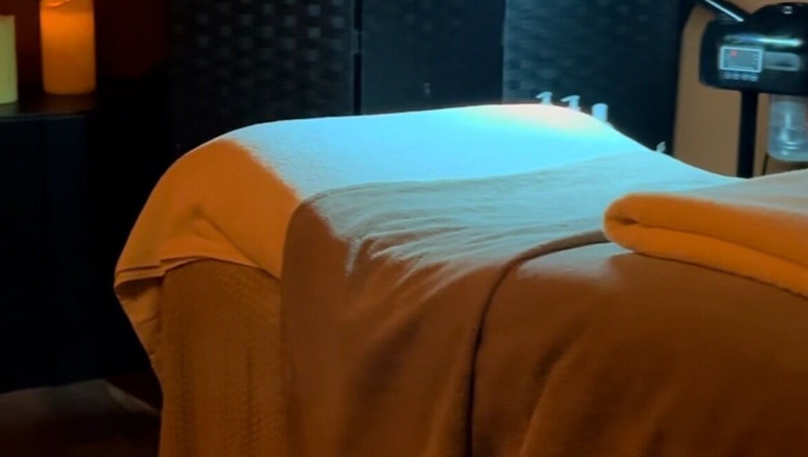 Spa bed with warm lighting at Face:it, Borve, Scotland, GB, creating a calming and relaxing atmosphere.