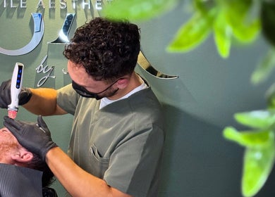 Practitioner performing skincare at Smile Aesthetics by Jamie in Cardiff, Wales, GB.