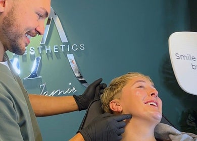 Client enjoying service at Smile Aesthetics by Jamie, Cardiff, Wales, GB.