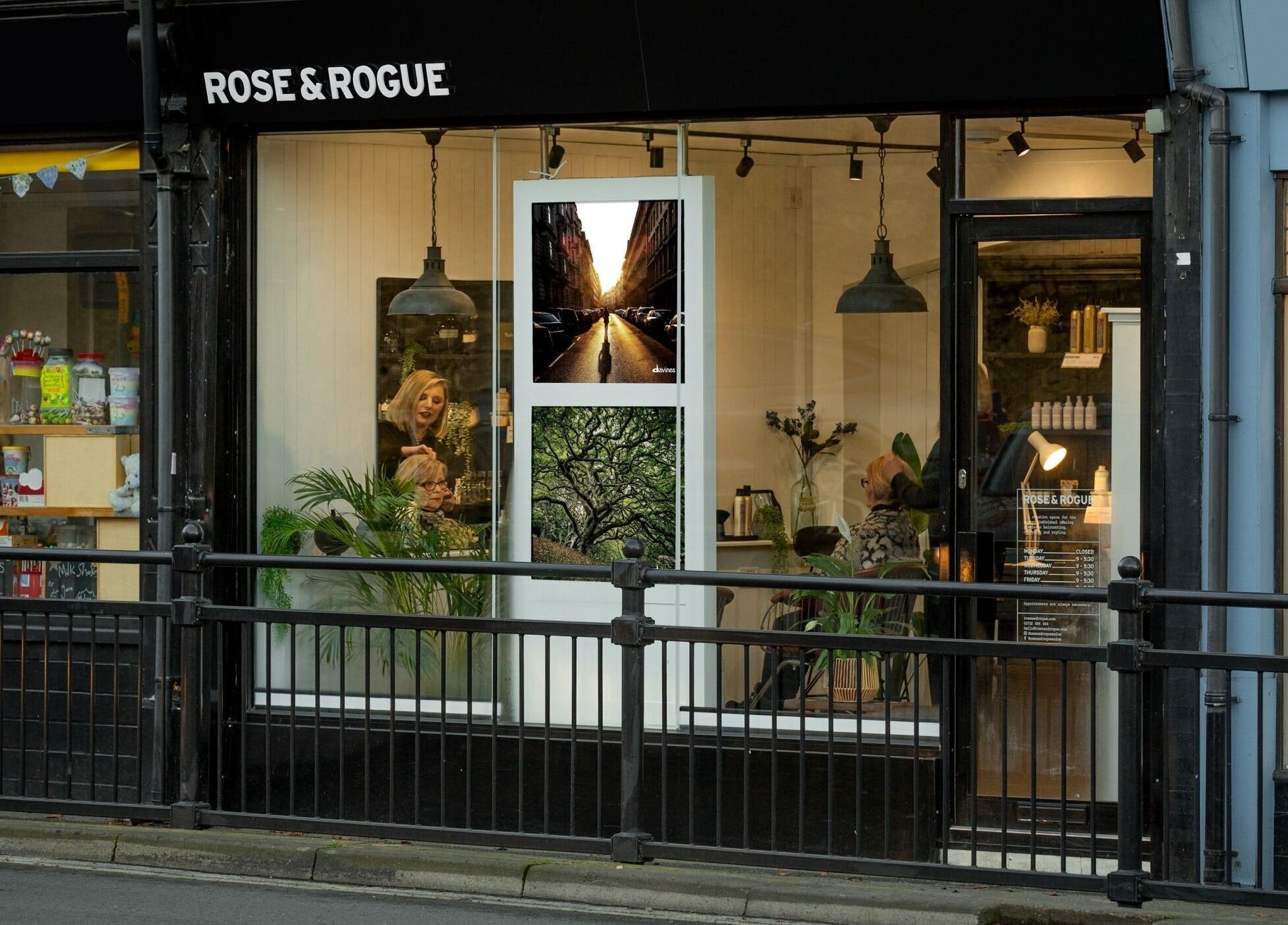 Exterior view of Rose and Rogue beauty venue in Sevenoaks, England, GB, showcasing elegant black signage.