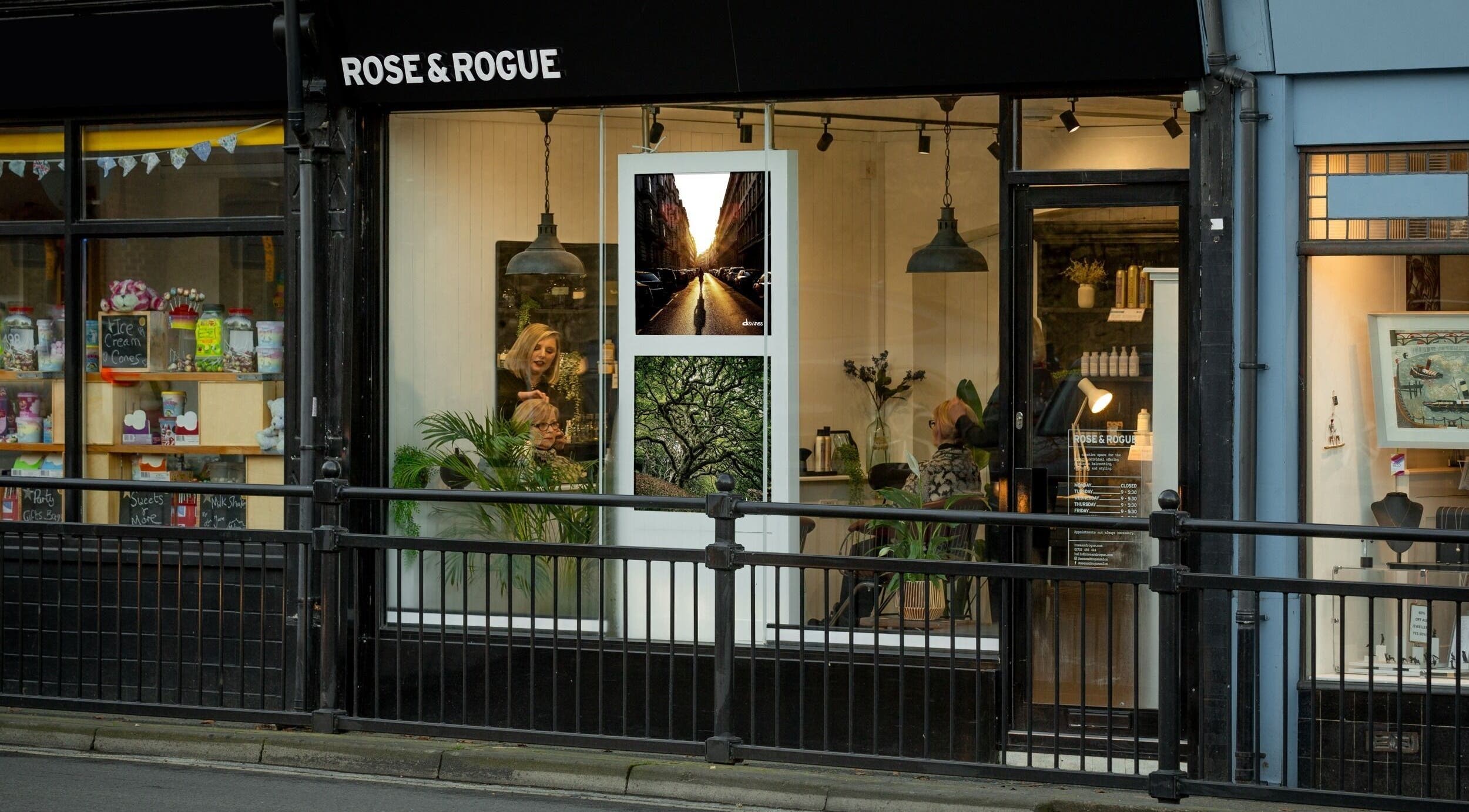Exterior view of Rose and Rogue beauty venue in Sevenoaks, England, GB, showcasing elegant black signage.