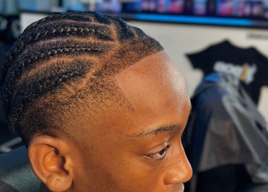 Intricate braided hairstyle showcased at LM CUTZ in London, England, GB, highlighting expert technique.