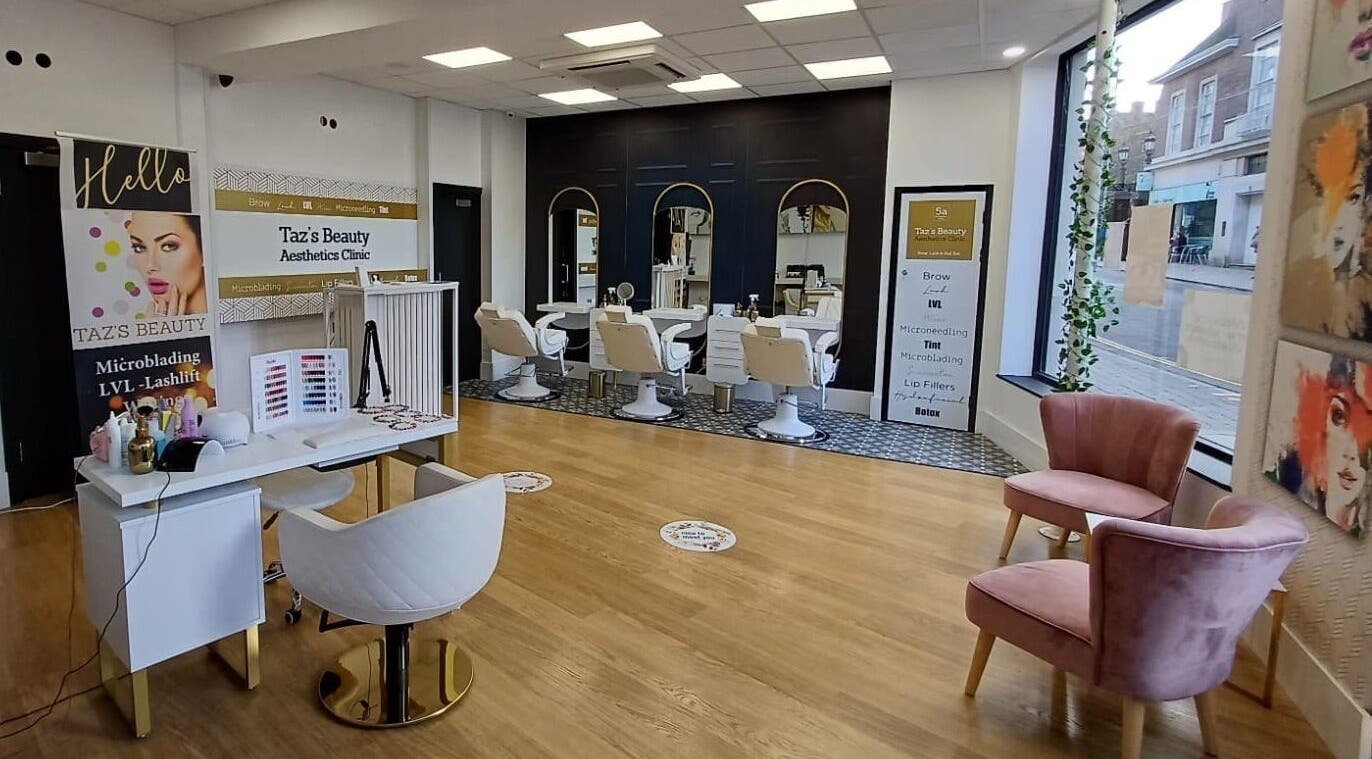 Chic interior of Taz Beauty, featuring modern salon chairs and decor in Norwich, England, GB.