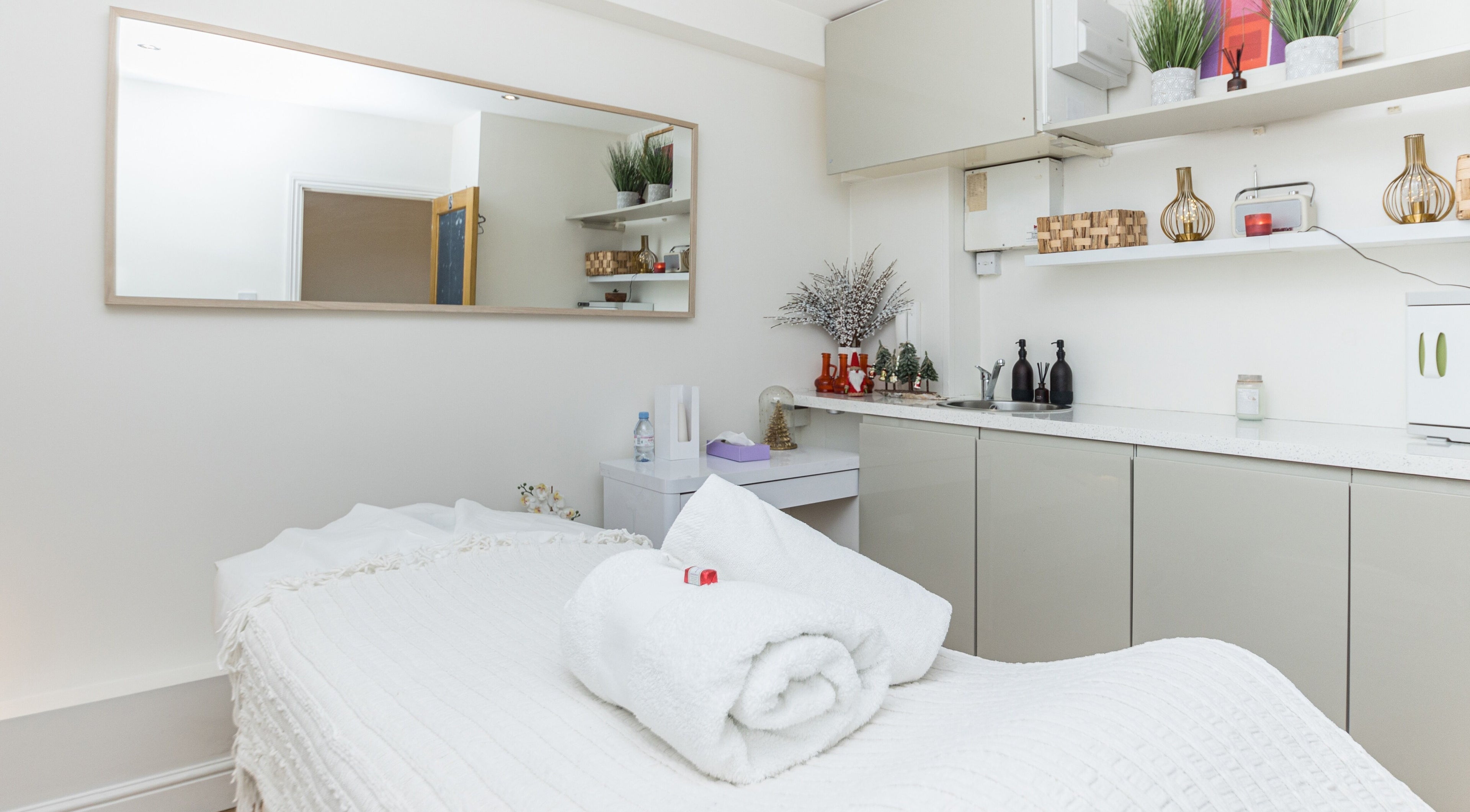 A tranquil treatment room at Restart London, featuring elegant decor in London, England, GB.