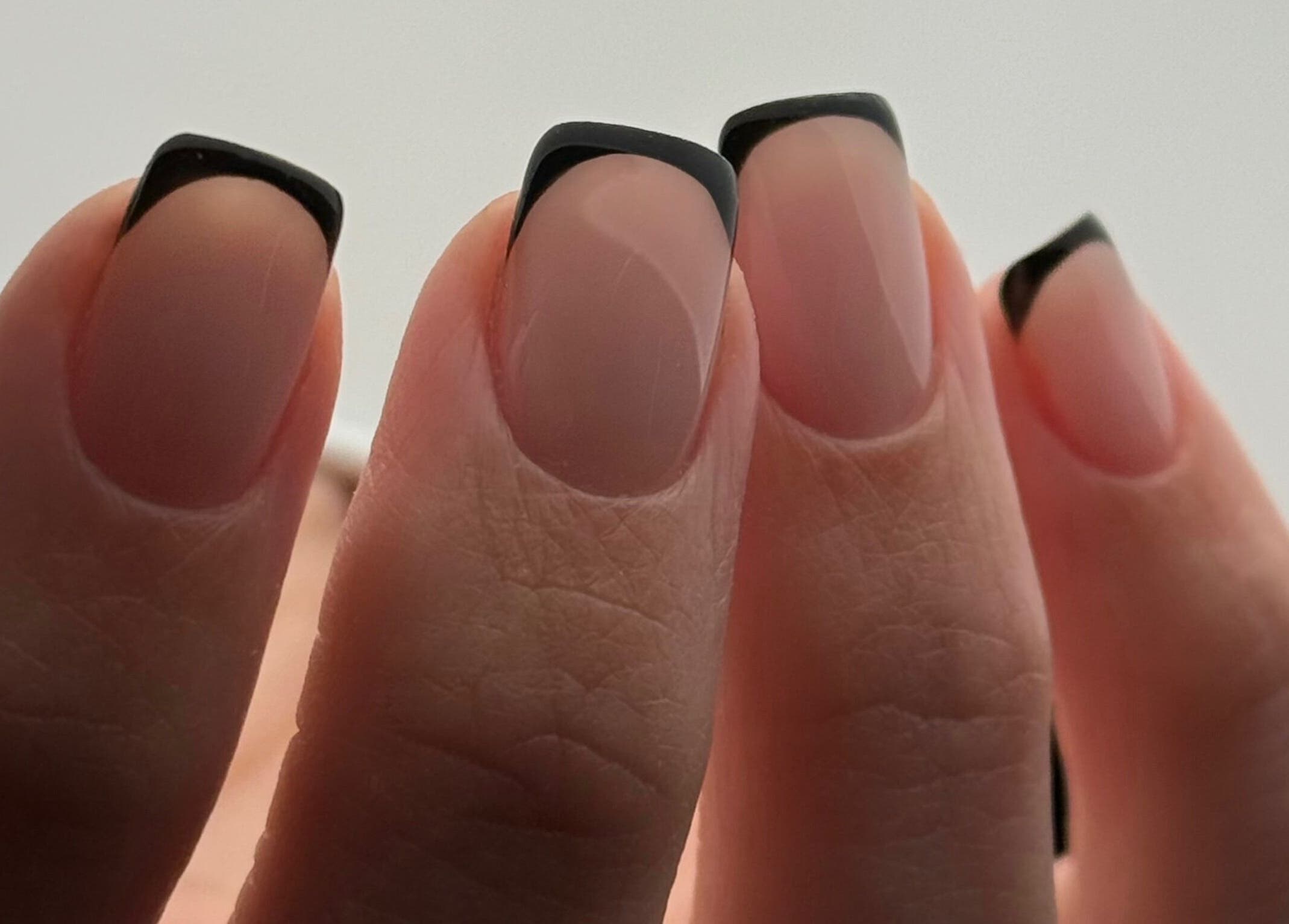 Chic black French manicure by Heather Connor at Elevate in Linlithgow, Scotland, GB.