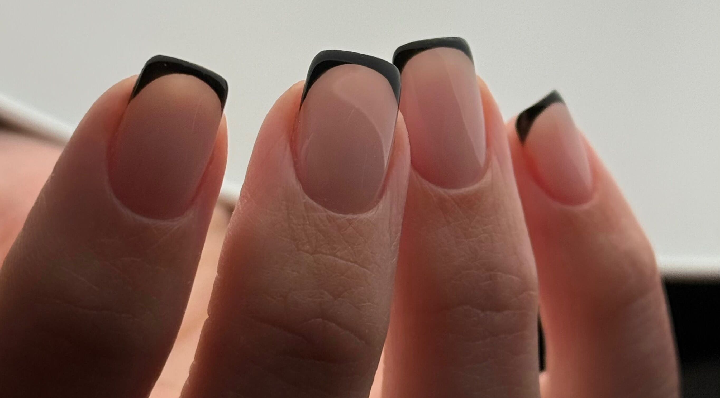 Chic black French manicure by Heather Connor at Elevate in Linlithgow, Scotland, GB.