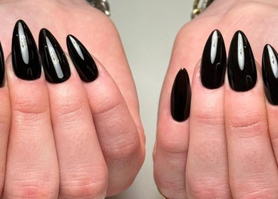 Elegant black nails by Heather Connor at Elevate, Linlithgow, Scotland, GB. Perfect for a glamorous look.