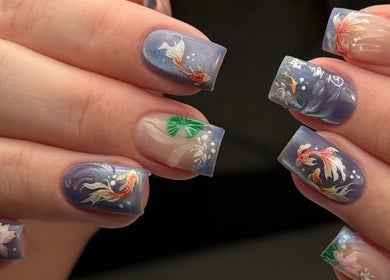 Intricate koi fish nail art by Heather Connor at Elevate, Linlithgow, Scotland, GB. Vibrant and detailed designs.
