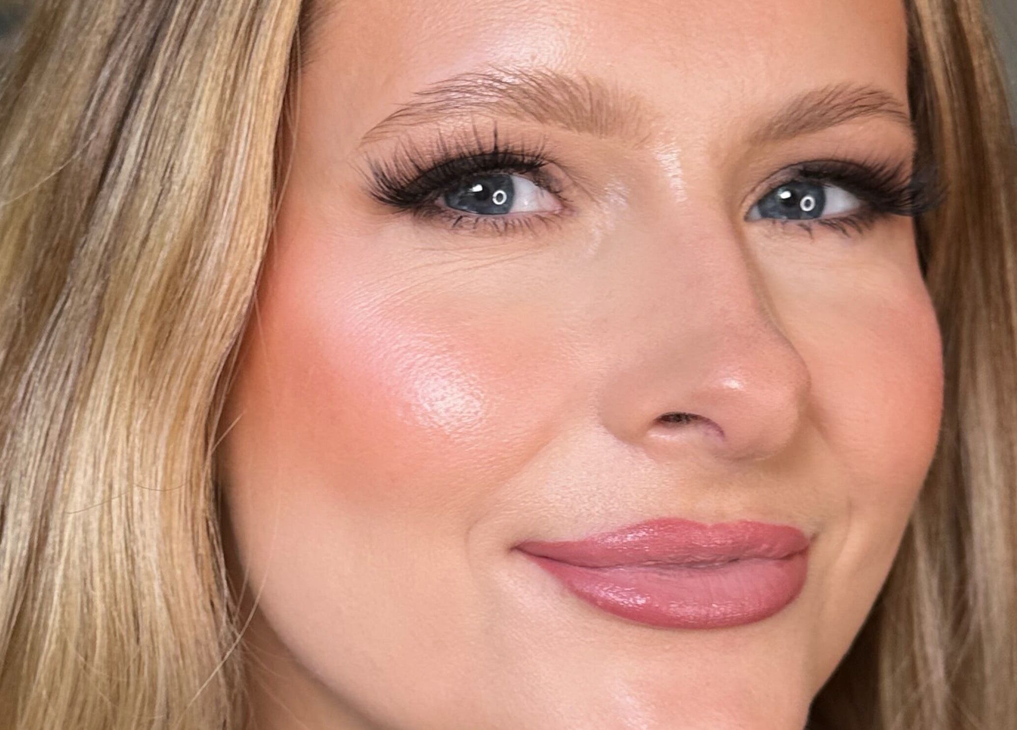 Close-up of a woman's glowing makeup by Heather Connor at Elevate, Linlithgow, Scotland, GB.