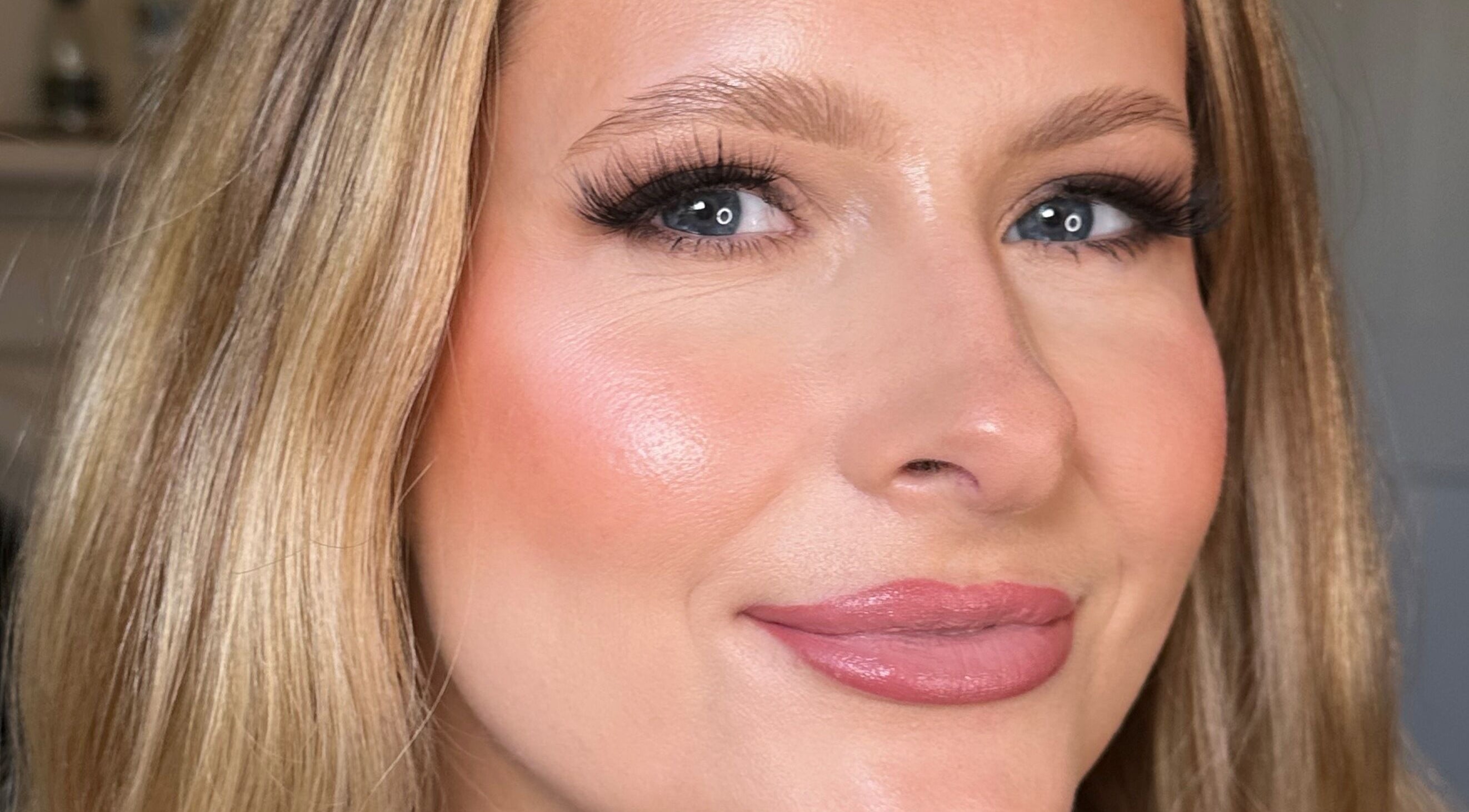 Close-up of a woman's glowing makeup by Heather Connor at Elevate, Linlithgow, Scotland, GB.