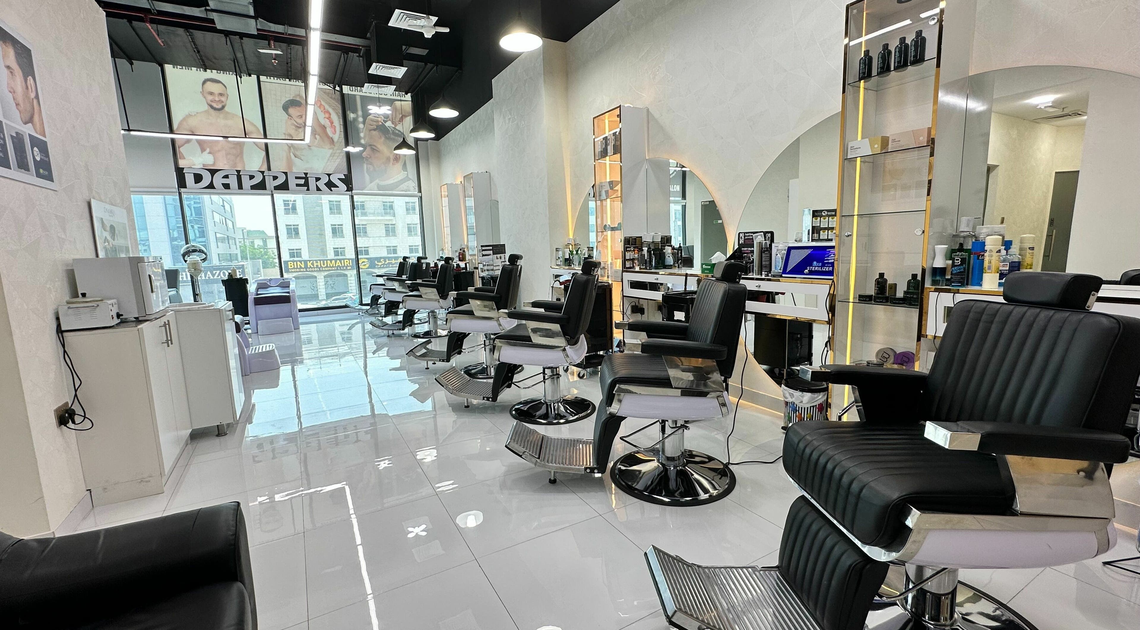 Modern barber chairs and sleek interior at Dappers Gents Salon, Dubai, Dubai, AE.