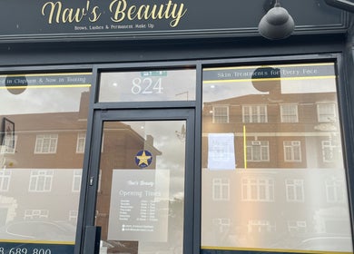 Nav’s Beauty entrance showcasing elegant facade with signage in London, England, GB.