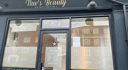 Nav’s Beauty entrance showcasing elegant facade with signage in London, England, GB.