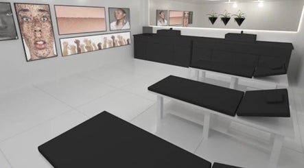 Modern treatment room at Navs Beauty Clapham, London, England, GB with sleek decor and stylish artwork.