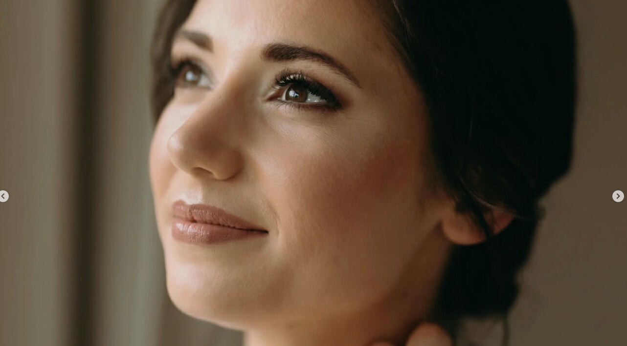 Woman with elegant makeup at Oulik Vroulik, Cape Town, Western Cape, ZA.