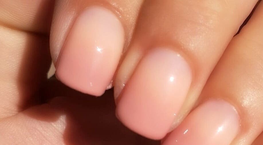 Elegant nude manicure at Oulik Vroulik, Cape Town, Western Cape, ZA showcasing polished style.