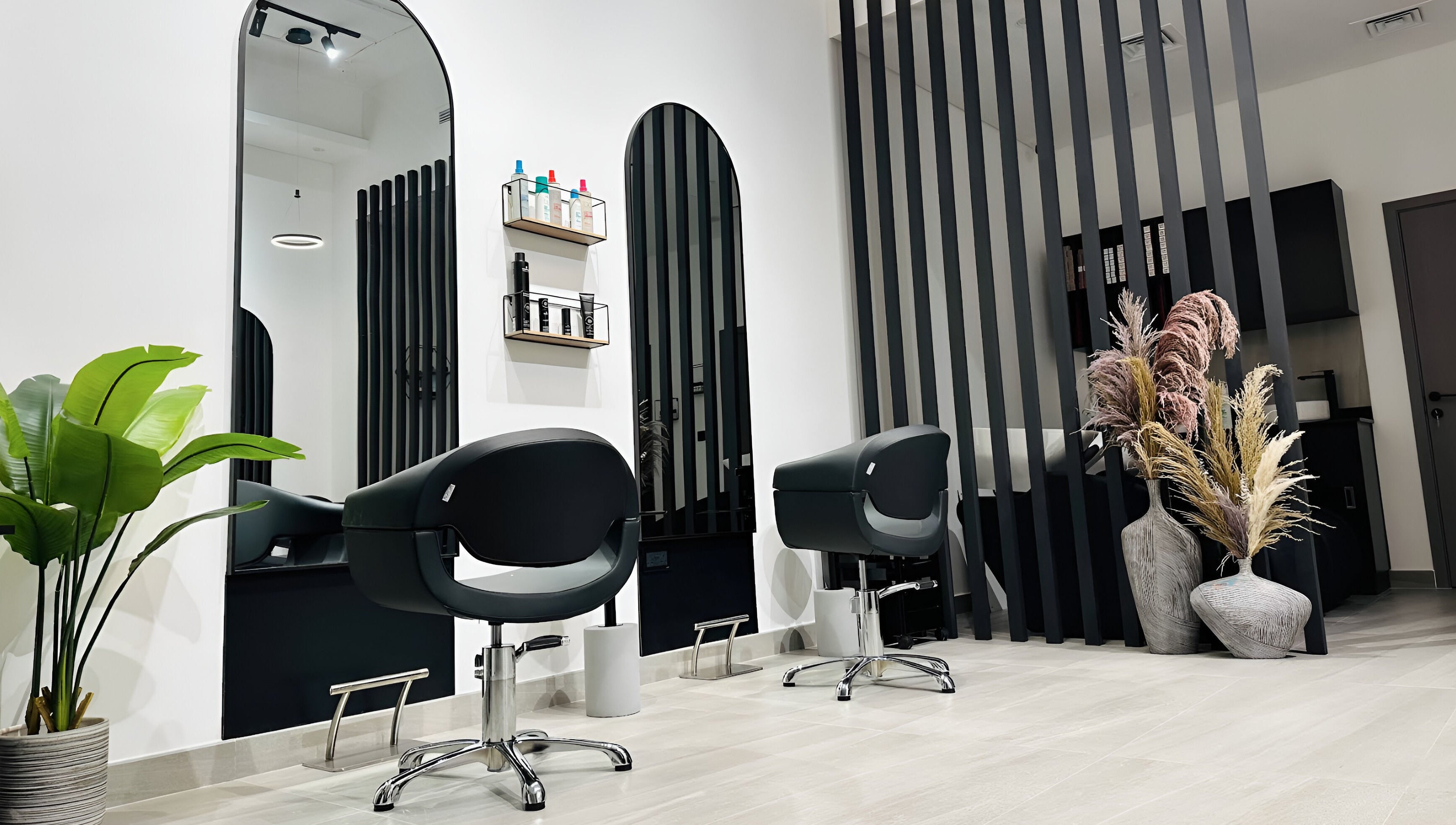 Chic interior of Always On Show Hair Studio in Dubai, قرية جميرا الدائرية, AE featuring modern styling chairs.