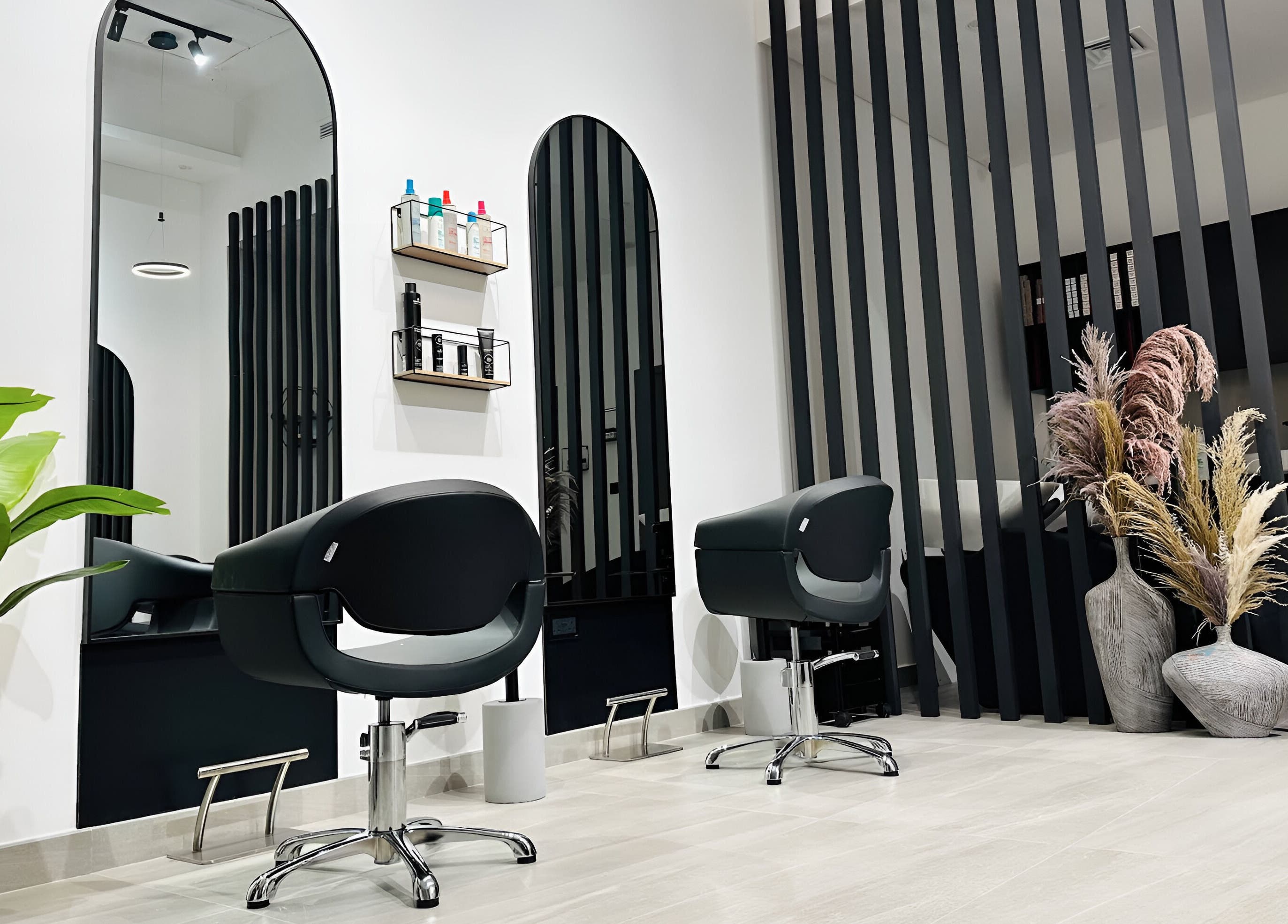 Chic interior of Always On Show Hair Studio in Dubai, قرية جميرا الدائرية, AE featuring modern styling chairs.